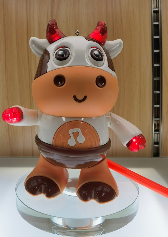 Văcuța Dansatoare cu Lumină și Muzică